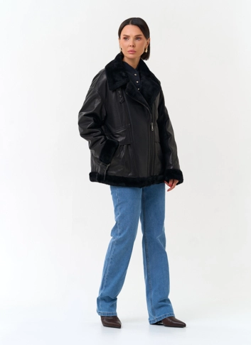Женский пуховик из натуральной кожи фото